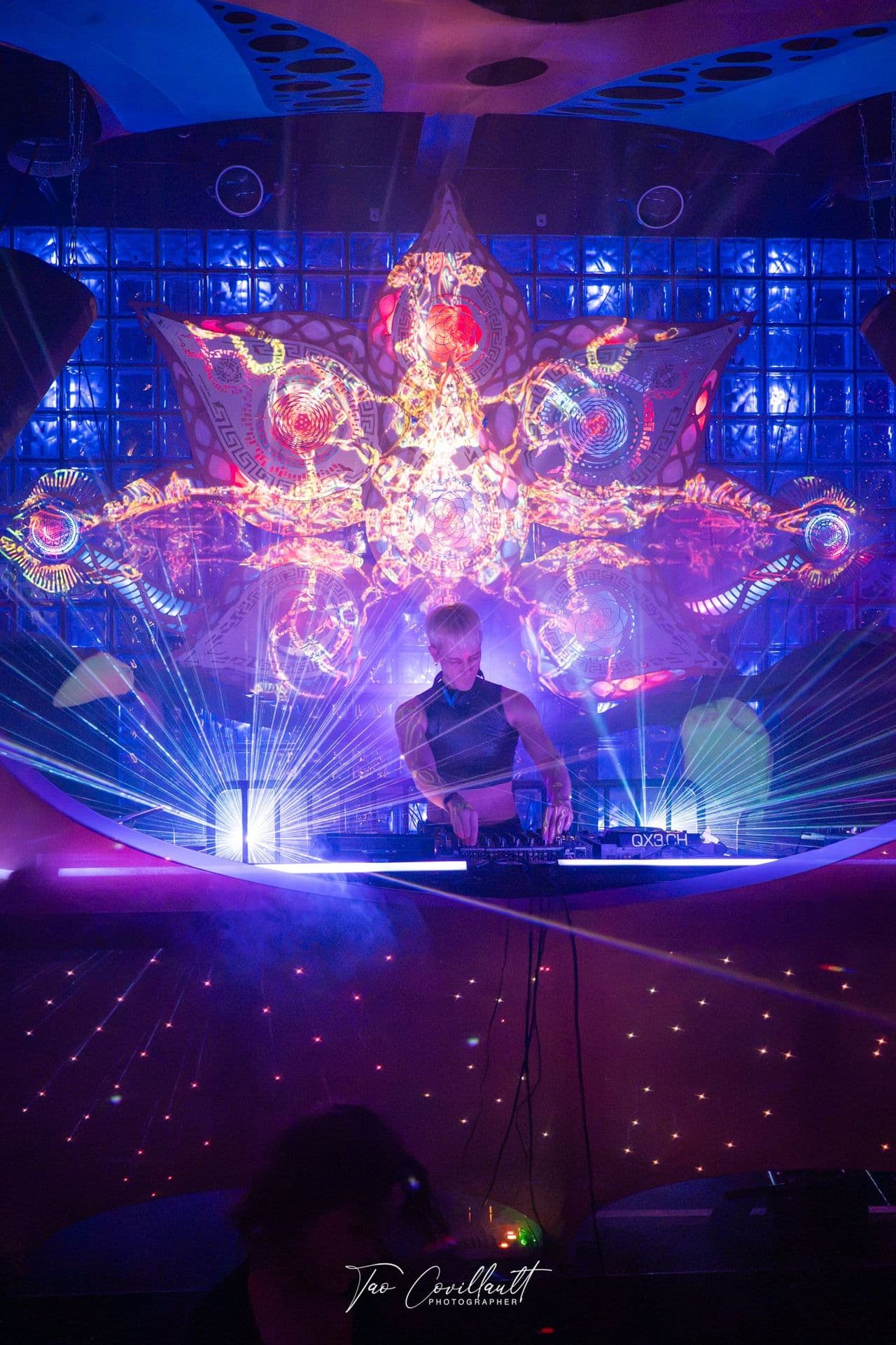 The Dance Temple stage with its mandala installation and laser fan